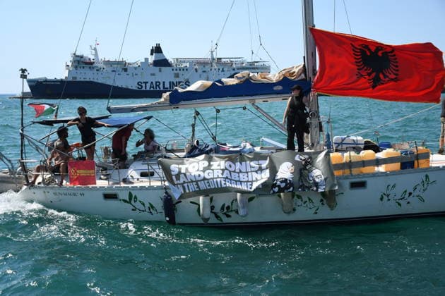 Global Sumud Flotilla activists arrive in Albania VLORE, ALBANIA - AUGUST 21: Boats carrying pro-Palestinian Italian and Albanian activists arrive off the coast of Vlore after sailing from Brindisi, Italy, on August 21, 2026 in Vlore, Albania. Several of the vessels had reportedly been damaged by the Israeli military during the flotilla s previous mission. The activists arrival coincides with the anniversary of the 1991 exodus in which thousands of Albanian refugees reached Italy s Puglia region aboard an overcrowded ship. The group is also expected to support the Flamingo Revolution protest against the reported sale of a beach in Zvernec for a tourism project allegedly linked to Ivanka Trump and Jared Kushner. Olsi Shehu Anadolu Vlore  Copyright: x2026xAnadoluxOlsixShehux