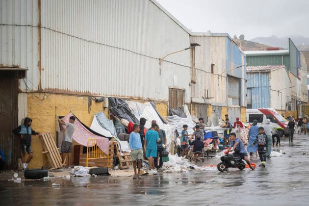 The humanitarian crisis in Ceuta continues. Migrants camped out in the Tarajal warehouses, August 21, 2026, in Ceuta, Spain. Ceuta continues to face a serious humanitarian crisis following the historic mass influx of more than 70,000 migrants who swam across the Tarajal on July 30 and 31. Although the police deployment and border reinforcement by Moroccan authorities have succeeded in curbing the influx, the autonomous city continues to face a serious humanitarian, health, and security crisis. AUGUST 21, 2026, Spain  Copyright: xMarcosxMorenox 7724463