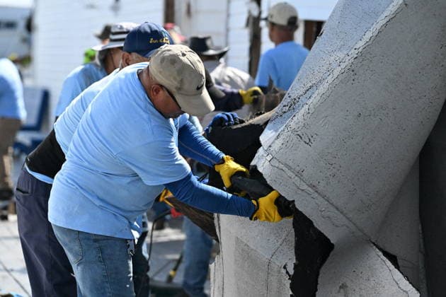 Tornado damage at Atlantic Beach in Long Island, New York NEW YORK, UNITED STATES - AUGUST 21: Emergency personnel and cleanup crews work amidst debris at the Sun and Surf Beach Club in Atlantic Beach, Long Island, New York, United States on August 21, 2026, following a rare tornado touchdown. The storm made landfall at approximately 7:11 p.m. on Thursday evening as a waterspout before moving ashore, destroying roughly 50 cabanas and tearing off roofs across the facility while nearly 100 people were present. Nassau County declared a state of emergency overnight as search teams swept the property, reporting only one minor injury, while the National Weather Service officially confirmed the tornadic event on Friday morning Kyle Mazza Anadolu  Copyright: x2026xAnadoluxKylexMazzax