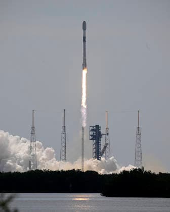 As viewed from the Complex 39 viewing site, SpaceX launches the Falcon 9 rocket carrying an additional 29 Starlink satellites on mission 10-39 at at 11:14 AM from Launch Complex 40 at the Cape Canaveral Space Force Station, Florida on Friday August 21, 2026.  CCP20260821004 JOExMARINO