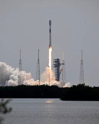 As viewed from the Complex 39 viewing site, SpaceX launches the Falcon 9 rocket carrying an additional 29 Starlink satellites on mission 10-39 at at 11:14 AM from Launch Complex 40 at the Cape Canaveral Space Force Station, Florida on Friday August 21, 2026.  CCP20260821003 JOExMARINO