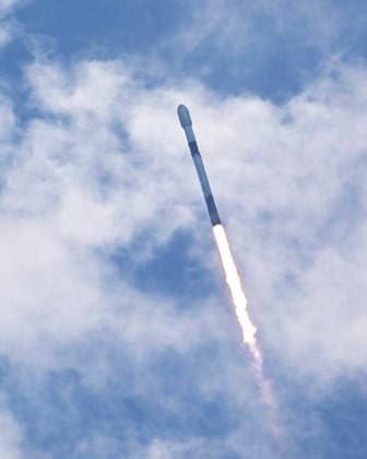 As viewed from the Complex 39 viewing site, SpaceX launches the Falcon 9 rocket carrying an additional 29 Starlink satellites on mission 10-39 at at 11:14 AM from Launch Complex 40 at the Cape Canaveral Space Force Station, Florida on Friday August 21, 2026.  CCP20260821007 JOExMARINO