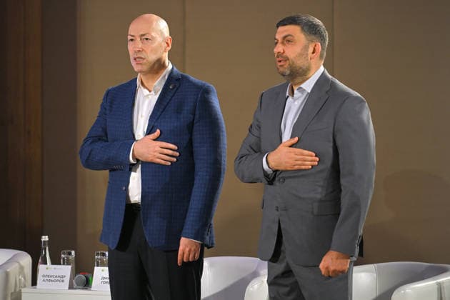 Ukrainian journalist and founder of the GORDON online publication Dmytro Gordon (L) and Ukrainian politician, entrepreneur and former Ukrainian Prime Minister Volodymyr Groysman perform the national anthem during the 35 Years of Restored Independence: Unity Around the Flag National Roundtable, organised by the Kyiv Security Forum, ahead of Ukraine’s 35th Independence Day, Kyiv, Ukraine, August 21, 2026. (Photo by Yevhen Kotenko Ukrinform) National roundtable marking 35 years of Ukraine’s independence  Copyright: xYevhenxKotenkox