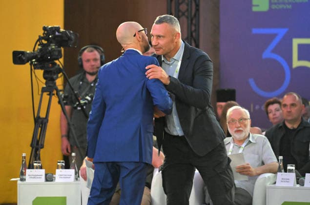 Kyiv Security Forum chairman and former Ukrainian Prime Minister Arseniy Yatsenyuk (L) and Kyiv city head Vitali Klitschko greet each other during the 35 Years of Restored Independence: Unity Around the Flag National Roundtable, organised by the Kyiv Security Forum, ahead of Ukraine’s 35th Independence Day, Kyiv, Ukraine, August 21, 2026. (Photo by Yevhen Kotenko Ukrinform) National roundtable marking 35 years of Ukraine’s independence  Copyright: xYevhenxKotenkox