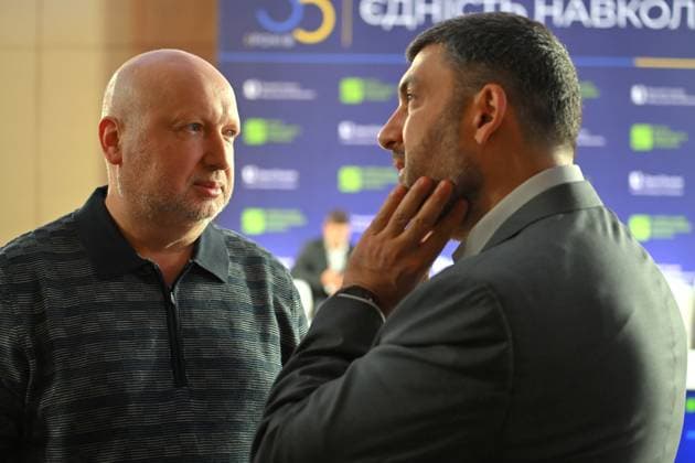 Former Speaker of the Ukrainian Parliament, Acting President of Ukraine (2014) Oleksandr Turchynov (L) and Ukrainian politician, entrepreneur and former Ukrainian Prime Minister Volodymyr Groysman talk on the sidelines of the 35 Years of Restored Independence: Unity Around the Flag National Roundtable, organised by the Kyiv Security Forum, ahead of Ukraine’s 35th Independence Day, Kyiv, Ukraine, August 21, 2026. (Photo by Yevhen Kotenko Ukrinform) National roundtable marking 35 years of Ukraine’s independence  Copyright: xYevhenxKotenkox