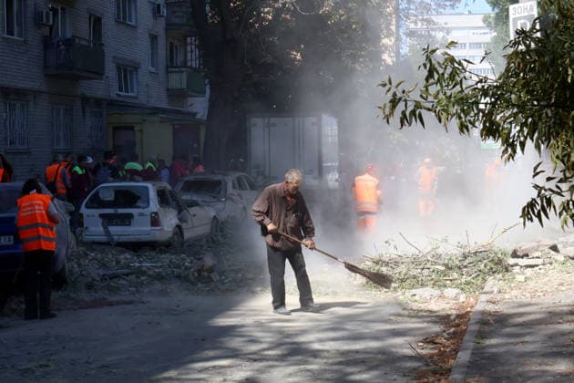 RECORD DATE NOT STATED Municipal workers clear debris from a street near damaged residential buildings in Kyiv’s Solomianskyi district following an overnight Russian missile attack on the capital, Ukraine, on August 20, 2026. Eight people were killed in the district as a result of Russia’s overnight massive combined attack. At least 16 multi-storey residential buildings were damaged, including a nine-storey building whose upper floors were destroyed, as well as a school, a kindergarten and premises of a children’s hospital. State Emergency Service rescuers and municipal workers are dismantling hazardous structures and clearing debris at the impact sites. An emergency assistance centre has been set up for those affected (Photo by Pavlo Bahmut Ukrinform) Aftermath  Copyright: xPavloxBahmutx