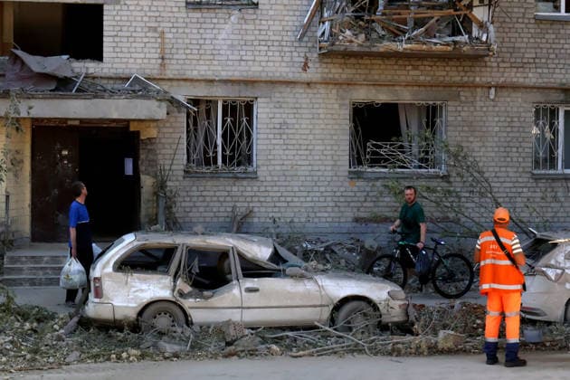 RECORD DATE NOT STATED A civilian car damaged in a Russian missile attack in the courtyard of a multi-storey residential building in Kyiv’s Solomianskyi district, Ukraine, on August 20, 2026. Eight people were killed in the district as a result of Russia’s overnight massive combined attack. At least 16 multi-storey residential buildings were damaged, including a nine-storey building whose upper floors were destroyed, as well as a school, a kindergarten and premises of a children’s hospital. State Emergency Service rescuers and municipal workers are dismantling hazardous structures and clearing debris at the impact sites. An emergency assistance centre has been set up for those affected (Photo by Pavlo Bahmut Ukrinform) Aftermath of Russian strike in Solomianskyi  Copyright: xPavloxBahmutx