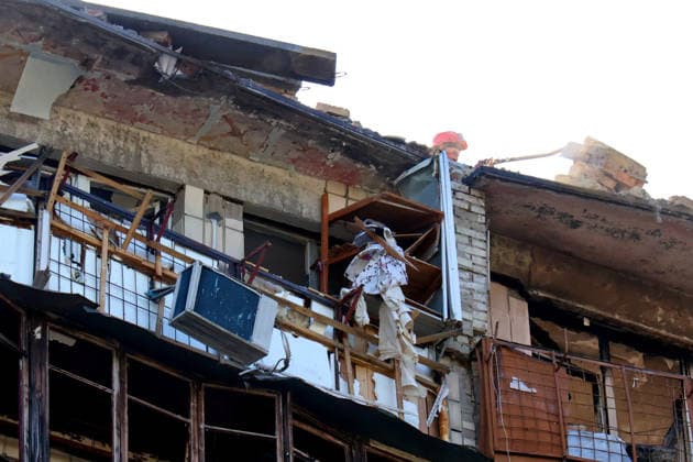 RECORD DATE NOT STATED A State Emergency Service rescuer clears hazardous debris from the destroyed roof of a residential building in Kyiv’s Solomianskyi district following an overnight Russian attack on the capital, Ukraine, on August 20, 2026. Eight people were killed in the district as a result of Russia’s overnight massive combined attack. At least 16 multi-storey residential buildings were damaged, including a nine-storey building whose upper floors were destroyed, as well as a school, a kindergarten and premises of a children’s hospital. State Emergency Service rescuers and municipal workers are dismantling hazardous structures and clearing debris at the impact sites. An emergency assistance centre has been set up for those affected (Photo by Pavlo Bahmut U  Copyright: xPavloxBahmutx