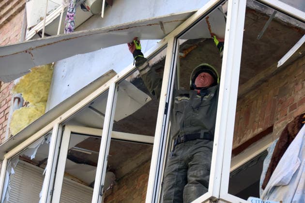 RECORD DATE NOT STATED A State Emergency Service rescuer dismantles hazardous structures on a balcony damaged in an overnight Russian attack on the capital, in an apartment of a multi-storey residential building in Kyiv’s Solomianskyi district, Ukraine, on August 20, 2026. Eight people were killed in the district as a result of Russia’s overnight massive combined attack. At least 16 multi-storey residential buildings were damaged, including a nine-storey building whose upper floors were destroyed, as well as a school, a kindergarten and premises of a children’s hospital. State Emergency Service rescuers and municipal workers are dismantling hazardous structures and clearing debris at the impact sites. An emergency assistance centre has been set up for those affec  Copyright: xPavloxBahmutx