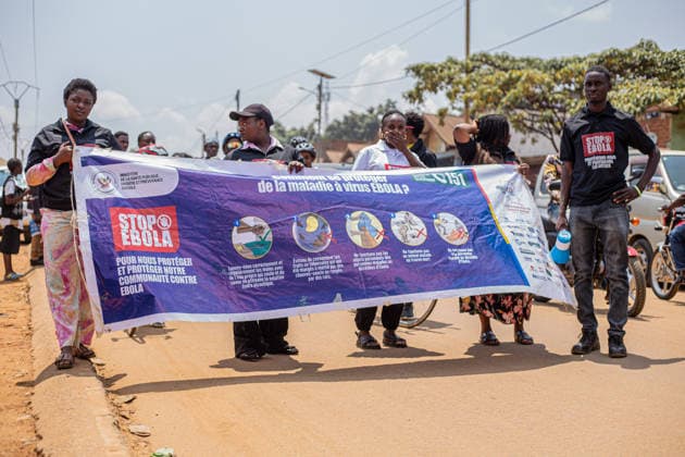 (260821) -- BENI, Aug. 21, 2026 -- Residents take to the streets to raise awareness of Ebola prevention in Beni, North Kivu Province, eastern Democratic Republic of the Congo (DRC), Aug. 21, 2026. DR CONGO-BENI-EBOLA PREVENTION-AWARENESS ShixYu 