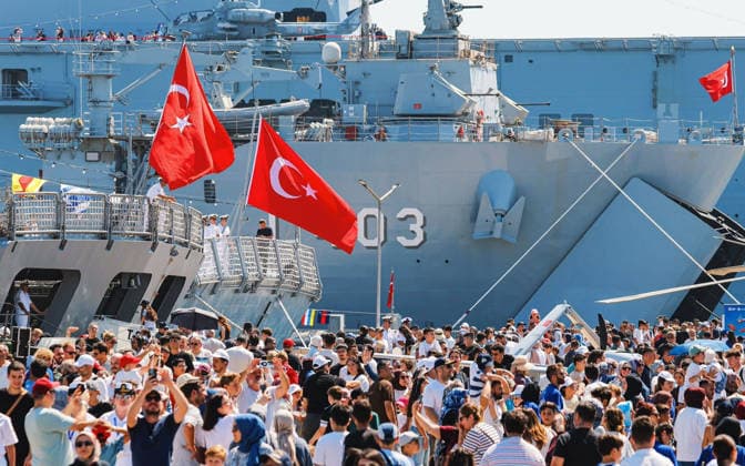 (260821) -- KOCAELI, Aug. 21, 2026 -- People visit the Teknofest Blue Homeland 2026, a defense and technology festival centered on naval capabilities, at the Golcuk Naval Shipyard Command in Kocaeli, T¨¹rkiye, on Aug. 21, 2026. ( Handout via Xinhua) T?RKIYE-BLUE HOMELAND-DEFENSE FESTIVAL MustafaxKaya 