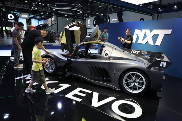 CHENGDU, CHINA - AUGUST 21: Visitors look at a high-performance sports car during the 29th Chengdu International Automobile Exhibition on August 21, 2026 in Chengdu, Sichuan Province of China. The event features about 1,600 vehicles from nearly 120 mainstream domestic and international automotive brands.  Copyright: xChinaxNewsxServicex 111661277068