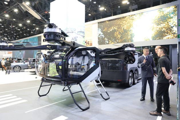 CHENGDU, CHINA - AUGUST 21: A flying car attracts visitors during the 29th Chengdu International Automobile Exhibition at China Western International Expo City on August 21, 2026 in Chengdu, Sichuan Province of China. The exhibition features nearly 120 domestic and international mainstream automobile brands showcasing approximately 1,600 vehicles under the theme Leading the Trend, Moving Towards the New.  Copyright: xChinaxNewsxServicex 111661277113