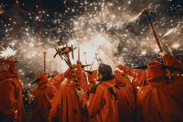 August 21, 2026, Barcelona, Catalonia, Spain: Fire runners gather to ignite their firework staffs beneath a shower of sparks during the traditional Ã¢â‚¬ËœCorrefocÃ¢â‚¬â ¢ at the Festa Major de Gracia Barcelona Spain - ZUMAo105 20260821_fap_o105_004 Copyright: xMatthiasxOesterlex