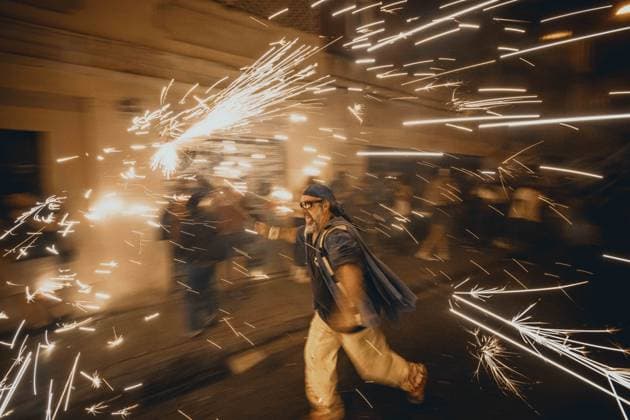 August 21, 2026, Barcelona, Catalonia, Spain: Fire runners in devil costumes charge through showers of sparks to the beat of drums during the traditional Ã¢â‚¬ËœCorrefocsÃ¢â‚¬â ¢ at BarcelonaÃ¢â‚¬â ¢s iconic Festa Major de Gracia. Barcelona Spain - ZUMAo105 20260821_fap_o105_005 Copyright: xMatthiasxOesterlex