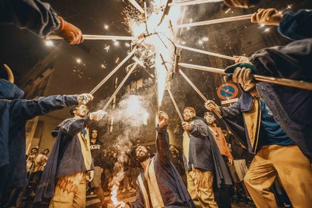August 21, 2026, Barcelona, Catalonia, Spain: Fire runners gather to ignite their firework staffs beneath a shower of sparks during the traditional Ã¢â‚¬ËœCorrefocÃ¢â‚¬â ¢ at the Festa Major de Gracia Barcelona Spain - ZUMAo105 20260821_fap_o105_007 Copyright: xMatthiasxOesterlex