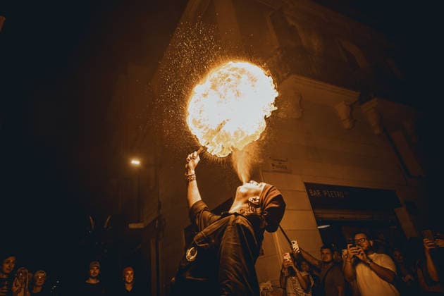 August 21, 2026, Barcelona, Catalonia, Spain: A fire breather blows a plume of fire during the traditional Ã¢â‚¬ËœCorrefocÃ¢â‚¬â ¢ at the Festa Major de Gracia Barcelona Spain - ZUMAo105 20260821_fap_o105_027 Copyright: xMatthiasxOesterlex