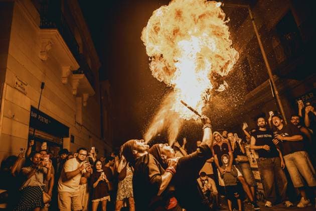 August 21, 2026, Barcelona, Catalonia, Spain: Two fire breathers blow a plume of fire during the traditional Ã¢â‚¬ËœCorrefocÃ¢â‚¬â ¢ at the Festa Major de Gracia Barcelona Spain - ZUMAo105 20260821_fap_o105_031 Copyright: xMatthiasxOesterlex