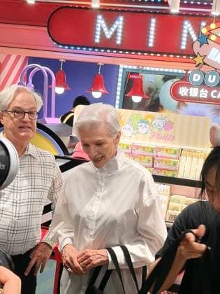 SHANGHAI, CHINA - AUGUST 22: American author and model Maye Musk shops for blind boxes at a MINISO store on Nanjing Road Pedestrian Street on August 22, 2026 in Shanghai, China.  Copyright: xVCGx 111661421182