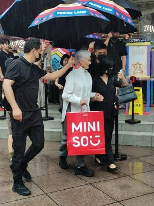 SHANGHAI, CHINA - AUGUST 22: American author and model Maye Musk shops for blind boxes at a MINISO store on Nanjing Road Pedestrian Street on August 22, 2026 in Shanghai, China.  Copyright: xVCGx 111661421175