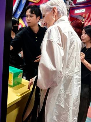 SHANGHAI, CHINA - AUGUST 22: American author and model Maye Musk shops for blind boxes at a MINISO store on Nanjing Road Pedestrian Street on August 22, 2026 in Shanghai, China.  Copyright: xVCGx 111661421183