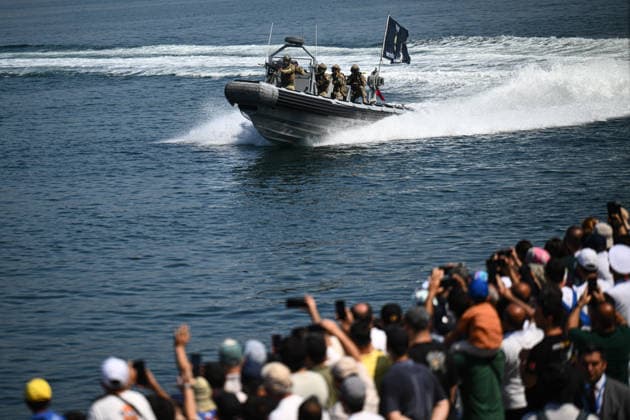 TEKNOFEST Blue Homeland KOCAELI, TURKIYE - AUGUST 22: Underwater Offstage (SAT) and Underwater Defense (SAS) commandos of the Turkish Naval Forces perform military demonstrations during the TEKNOFEST Blue Homeland at the Golcuk Naval Shipyard Command in Kocaeli, Turkiye, on August 22, 2026. Organized under the main leadership of the Turkish National Defense Ministry and the Turkish Technology Team Foundation (T3 Foundation), with Anadolu as the Global Communication Partner, the event showcases Turkiye s maritime power, defense capabilities, and indigenous technologies. Gathering technology and defense industry enthusiasts around a maritime focus, the festival will welcome visitors through August 23. Akin Celiktas Anadolu Kocaeli Turkey. E  Copyright: x2026xAnadoluxAkinxCeliktasx
