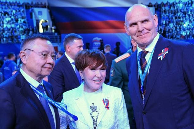 Russia UR Party Congress 9226410 22.08.2026 From left, Russian Minister of Construction, Housing and Utilities Irek Faizullin, Co-Chairperson of the All-Russian Association for the Development of Local Self-Government Irina Guseva and Member of the Russian Federation Council Committee on Foreign Affairs Alexander Karelin wait before a session of the second stage of the 23rd Congress of the United Russia party in Moscow, Russia. Alexey Nikolskiy Sputnik Moscow Russia  Copyright: xAlexeyxNikolskiyx