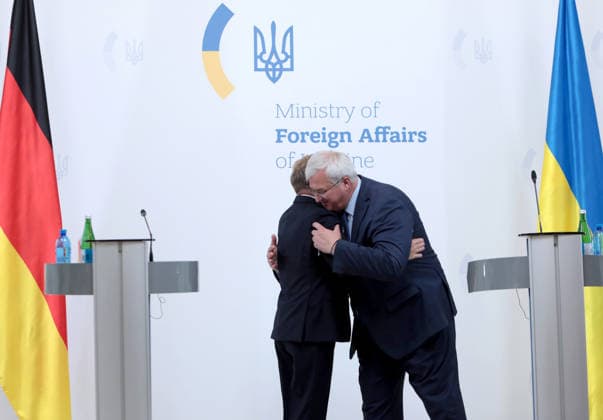 Foreign Minister of Ukraine Andrii Sybiha (R) and Federal Minister for Foreign Affairs of Germany Johann Wadephul share an embrace at the end of their joint news conference following negotiations, Kyiv, Ukraine, August 22, 2026. The talks focused on strengthening defence support for Ukraine, protecting critical infrastructure, preparing for winter, and diplomatic steps to end the war. The German Foreign Minister’s visit took place on the eve of the 35th anniversary of Ukraine’s independence, amid another wave of massive Russian attacks on civilian targets. (Photo by Hennadii Minchenko Ukrinform) Joint news conference of Ukrainian and German Foreign Ministers in Kyiv  Copyright: xHennadiixMinchenkox