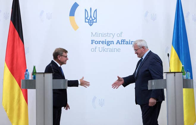 Andrii Sybiha and Johann Wadephul Joint Press Conference - Kyiv Foreign Minister of Ukraine Andrii Sybiha (R) shakes hands with Federal Minister for Foreign Affairs of Germany Johann Wadephul at the end of their joint news conference following negotiations in Kyiv, Ukraine on August 22, 2026. The talks focused on strengthening defence support for Ukraine, protecting critical infrastructure, preparing for winter, and diplomatic steps to end the war, with the German Foreign Minister s visit taking place on the eve of the 35th anniversary of Ukraine s independence amid another wave of massive Russian attacks on civilian targets. Photo by Hennadii Minchenko Ukrinform ABACAPRESS.COM Kyiv Ukraine  Copyright: xMinchenkoxHennadii Ukrinform ABACAx