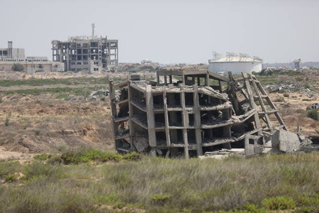 General View Shows War Damage in al-Mughraqa A general view shows the scale of destruction in residential areas in the al-Mughraqa area of the central Gaza Strip on August 22, 2026, as Palestinians move between the rubble of buildings destroyed during the war. Rubble and parts of collapsed buildings line both sides of the road, highlighting the widespread damage to the urban landscape and the daily life of residents. Photo by Hassan al-Jedi apaimages Nusairat Gaza Strip Palestinian Territory 220826_Mughraqa_HJ_00(20).jpeg Copyright: xapaimagesxHassanxal-Jedixx xapaimagesx