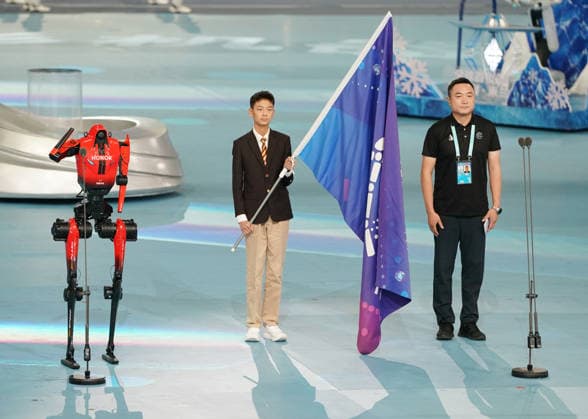(260822) -- BEIJING, Aug. 22, 2026 -- A humanoid robot takes an oath during the opening ceremony of the 2nd World Humanoid Robot Games in Beijing, capital of China, Aug. 22, 2026. ) (SP)CHINA-BEIJING-WORLD HUMANOID ROBOT GAMES-OPENING CEREMONY (CN) ZhangxChenlin 