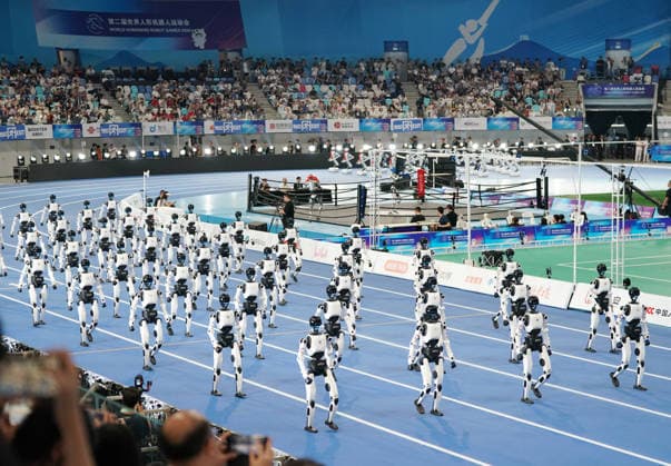 (260822) -- BEIJING, Aug. 22, 2026 -- Humanoid robots parade during the opening ceremony of the 2nd World Humanoid Robot Games in Beijing, capital of China, Aug. 22, 2026. ) (SP)CHINA-BEIJING-WORLD HUMANOID ROBOT GAMES-OPENING CEREMONY (CN) ZhangxChenlin 