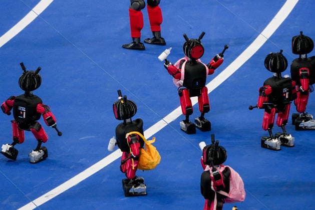 (260822) -- BEIJING, Aug. 22, 2026 -- Humanoid robots perform during the opening ceremony of the 2nd World Humanoid Robot Games in Beijing, capital of China, Aug. 22, 2026. ) (SP)CHINA-BEIJING-WORLD HUMANOID ROBOT GAMES-OPENING CEREMONY (CN) JuxHuanzong 
