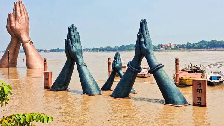 Floodwaters of the Ganga River reach the iconic Namaste sculpture at the ghat Varanasi Varanasi, Aug 22 (ANI): Floodwaters of the Ganga River reach the iconic Namaste sculpture at the ghat, in Varanasi on Saturday. Varanasi Uttar Pradesh India Copyright: xANIx ANI_20260822267