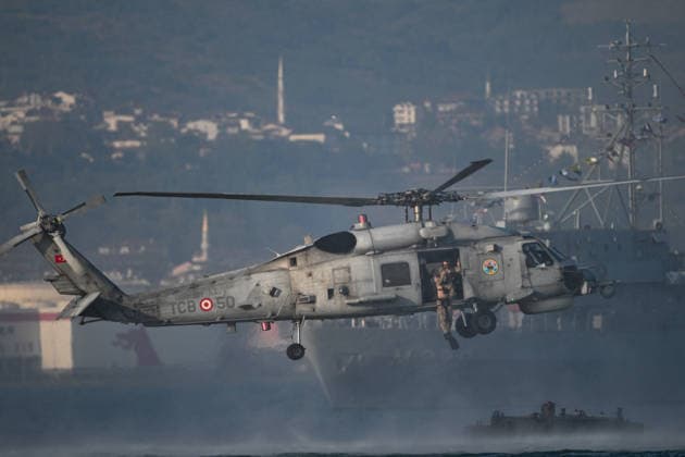 TEKNOFEST Blue Homeland KOCAELI, TURKIYE - AUGUST 22: Underwater Assault (SAT) and Underwater Defense (SAS) commandos affiliated with the Naval Forces Command execute demonstrations during the TEKNOFEST Blue Homeland festival in Kocaeli, Turkiye, on August 22, 2026. Organized under the main leadership of the Turkish Ministry of National Defense and the Turkish Technology Team Foundation (T3 Foundation), with Anadolu as the Global Communication Partner, the specialized event featured coordinated flybys by crewed military helicopters alongside Turkish-made Bayraktar TB2, Bayraktar TB3, and Bayraktar AKINCI unmanned aerial vehicles, highlighting the nation s naval aviation and defense capabilities. Akin Celiktas Anadolu Kocaeli Turkey. Edito  Copyright: x2026xAnadoluxAkinxCeliktasx