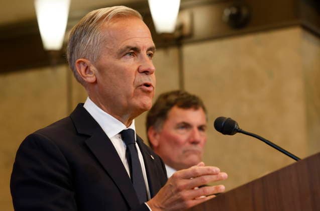 August 22, 2026, Ottawa, On, CANADA: Prime Minister Mark Carney speaks about Canada s response to new U.S. tariffs as Canada-U.S. Trade Minister Dominic LeBlanc listens during a news conference on Parliament Hill in Ottawa on Saturday, Aug. 22, 2026. Ottawa CANADA  - ZUMAc35_ 20260822_zaf_c35_019 Copyright: xPatrickxDoylex