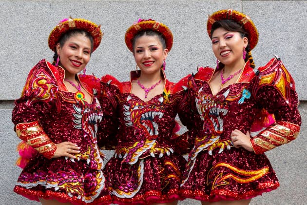 August 22, 2026, Madrid, Madrid, USA: Members of the San Simon Cochabamba pose for a photo before the Festividad de la Virgen de Urkupina along the Gran Via in Madrid, Spain on Saturday, August 22, 2026. Thousands of dancers and dozens of fraternal organizations process along the Gran VoÂ­a in the annual celebration in honor of BoliviaÃ¢â‚¬â ¢s Virgin of Urkupina. Madrid USA  - ZUMAg235 20260822_zap_g235_001 Copyright: xPaulxChristianxGordonx