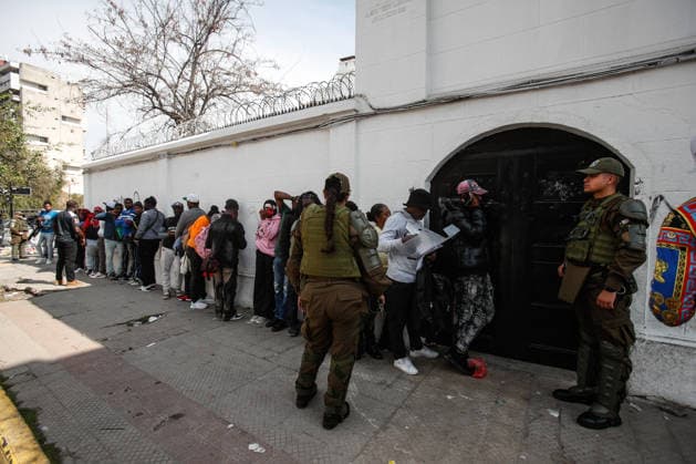 Santiago, August 22, 2026: The Haitian Embassy in Santiago is stormed by Haitian citizens due to issues with embassy staff and excessive fees for the paperwork required to work in Chile. Diego Martin Aton, Chile; Aton 1182674.jpeg  Copyright: DIEGOxMARTIN ATONxCHILE