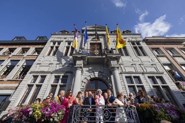 Jean-Luc Crucke (C-L) Le Berger David and Florent Van Grootenbrulle pictured during the 2026 edition of the Ducasse festivities with the marriage of the two giants, Monsieur et Madame Goliath , in Ath, on Saturday 22 August 2026.  NICOLASxMAETERLINCK 184020930