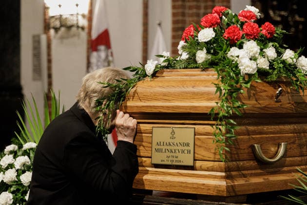 Belarusian opposition leader Aliaksandr Milinkevich Funeral in Warsaw - 22 Aug 2026 Inna Kuley, the widow of Belarusian politician Aliaksandr Milinkevich, cries beside his coffin during a farewell ceremony at St. John the Baptist Archcathedral in Warsaw s Old Town. Aliaksandr Milinkevich was a Belarusian politician and public figure. He was the united democratic opposition candidate in the 2006 presidential election and received the European Parliament’s Sakharov Prize. He died in exile in Poland on 11 August 2026, aged 79, after a long illness and complications following surgery. He will be buried at Pow?zki Cemetery in Warsaw, as he cannot be buried in Belarus. Warsaw Poland Copyright: xVolhaxShukailax xSOPAxImagesx VSHUKAILA_6510