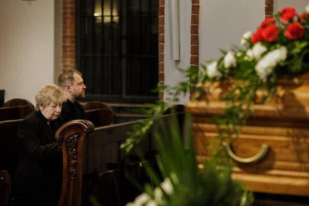 Belarusian opposition leader Aliaksandr Milinkevich Funeral in Warsaw - 22 Aug 2026 Inna Kuley, the widow of Belarusian politician Aliaksandr Milinkevich, and their son Igor Kuley sit near his coffin during a farewell ceremony at St. John the Baptist Archcathedral in Warsaw s Old Town. Aliaksandr Milinkevich was a Belarusian politician and public figure. He was the united democratic opposition candidate in the 2006 presidential election and received the European Parliament’s Sakharov Prize. He died in exile in Poland on 11 August 2026, aged 79, after a long illness and complications following surgery. He will be buried at Pow?zki Cemetery in Warsaw, as he cannot be buried in Belarus. Warsaw Poland Copyright: xVolhaxShukailax xSOPAxImagesx VSHUKAILA_6597