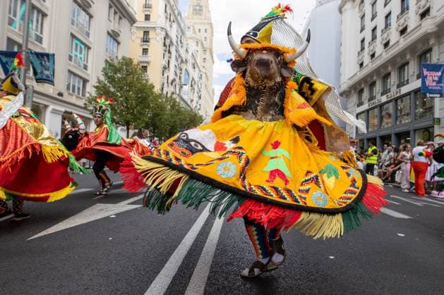August 22, 2026, Madrid, Spain: A man dressed in a traditional Bolivian folk costume, resembling a devil, parades in Madrid for the Virgin of Urkupina..A procession and folkloric parade featuring Bolivian dances such as the Morenada, Caporales, and Tinkus will take place along Madrid s Gran VoÂ­a in honor of the Virgin of Urkupina. The Virgin of Urkupina is one of the most important Marian devotions in Bolivia. Its origins lie in the town of Quillacollo, Cochabamba, and the tradition dates back to an apparition of the Virgin Mary to a shepherd girl around the year 1700. Madrid Spain  - ZUMAs197 20260822_aaa_s197_218 Copyright: xDavidxCanalesx