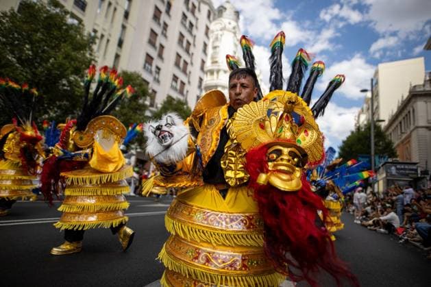 August 22, 2026, Madrid, Madrid, Spain: MADRID, SPAIN, AUGUST 22, 2026: Participants take part in a procession and folkloric parade along Madrid s Gran VoÂ­a in honor of the Virgin of UrkupioÂ±a. The event features traditional Bolivian dances, including Morenada, Caporales and Tinkus. Madrid Spain  - ZUMAq101 20260822_zna_q101_108 Copyright: xC.xCarvajalx