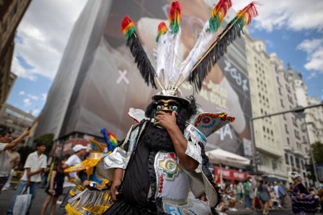 August 22, 2026, Madrid, Madrid, Spain: MADRID, SPAIN, AUGUST 22, 2026: Participants take part in a procession and folkloric parade along Madrid s Gran VoÂ­a in honor of the Virgin of UrkupioÂ±a. The event features traditional Bolivian dances, including Morenada, Caporales and Tinkus. Madrid Spain  - ZUMAq101 20260822_zna_q101_114 Copyright: xC.xCarvajalx