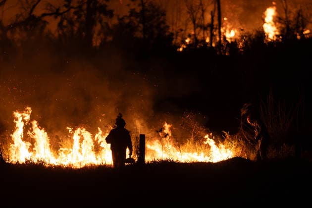 Wildfire burns vegetation along Washington Luis Highway in Sao Jose do Rio Preto A firefighter battles a large vegetation fire along the Washington Luis Highway (SP-310) in Sao Jose do Rio Preto, Sao Paulo, Brazil, on August 22, 2026. Sao Jose do Rio Preto SP-310 Sao Paulo Brazil