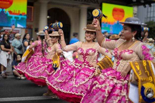 August 22, 2026, Madrid, Spain: Women dressed in traditional Bolivian folk costumes take part in a procession and folkloric parade along Madrid™s Gran Via in honor of the Virgin of Urkupina, one of Bolivia™s most important Marian devotions. The celebration features traditional Bolivian dances including Morenada, Caporales and Tinkus. Devotion to the Virgin of Urkupina originated in Quillacollo, near Cochabamba, Bolivia, and dates back to the colonial era. Madrid Spain - ZUMAs197 20260822_aaa_s197_217 Copyright: xDavidxCanalesx