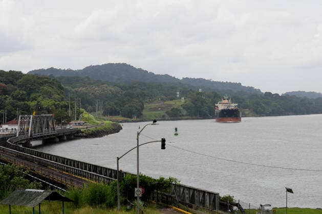 Panama Canal cuts daily transit slots amid reduced rainfall PANAMA CITY, PANAMA - AUGUST 22: A cargo vessel transits through the Panama Canal in Panama City, Panama, on August 22, 2026. The Panama Canal Authority announced temporary reductions in daily transit capacity at both the Neopanamax and Panamax locks due to below-expected rainfall in the canal watershed. Effective September 3, the number of daily slots at the Neopanamax Locks will be reduced to nine, while Panamax Locks will have 25 daily slots, falling to 23 from September 15. The authority said the measures aim to preserve service reliability and safeguard water resources for human consumption amid reduced precipitation despite the arrival of the rainy season and water-saving mea  Copyright: x2026xAnadoluxDanielxGonzalezx