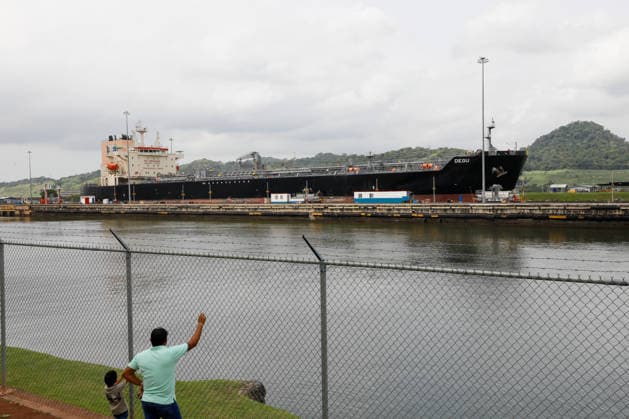 Panama Canal cuts daily transit slots amid reduced rainfall PANAMA CITY, PANAMA - AUGUST 22: A cargo vessel transits through the Panama Canal in Panama City, Panama, on August 22, 2026. The Panama Canal Authority announced temporary reductions in daily transit capacity at both the Neopanamax and Panamax locks due to below-expected rainfall in the canal watershed. Effective September 3, the number of daily slots at the Neopanamax Locks will be reduced to nine, while Panamax Locks will have 25 daily slots, falling to 23 from September 15. The authority said the measures aim to preserve service reliability and safeguard water resources for human consumption amid reduced precipitation despite the arrival of the rainy season and water-saving mea  Copyright: x2026xAnadoluxDanielxGonzalezx