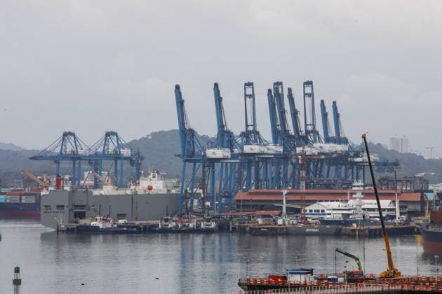 Panama Canal cuts daily transit slots amid reduced rainfall PANAMA CITY, PANAMA - AUGUST 22: A general view shows vessels and port facilities along the Panama Canal in Panama City, Panama, on August 22, 2026. The Panama Canal Authority announced temporary reductions in daily transit capacity at both the Neopanamax and Panamax locks due to below-expected rainfall in the canal watershed. Effective September 3, the number of daily slots at the Neopanamax Locks will be adjusted to nine, while the Panamax Locks will have 25 daily slots, falling to 23 from September 15. The authority said the measures aim to preserve service reliability and safeguard water resources for human consumption amid reduced precipitation despite the arrival of the rainy  Copyright: x2026xAnadoluxDanielxGonzalezx