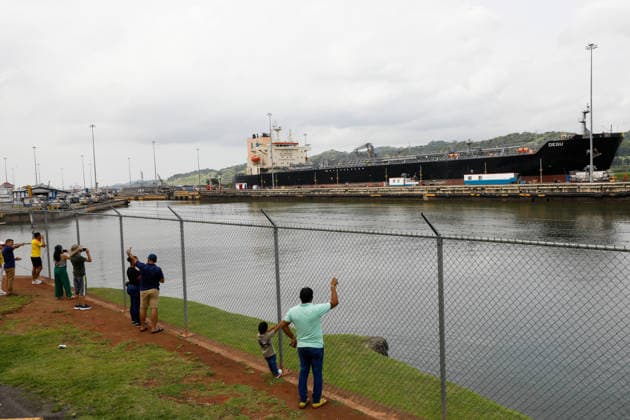 Panama Canal cuts daily transit slots amid reduced rainfall PANAMA CITY, PANAMA - AUGUST 22: A cargo vessel transits through the Panama Canal in Panama City, Panama, on August 22, 2026. The Panama Canal Authority announced temporary reductions in daily transit capacity at both the Neopanamax and Panamax locks due to below-expected rainfall in the canal watershed. Effective September 3, the number of daily slots at the Neopanamax Locks will be reduced to nine, while Panamax Locks will have 25 daily slots, falling to 23 from September 15. The authority said the measures aim to preserve service reliability and safeguard water resources for human consumption amid reduced precipitation despite the arrival of the rainy season and water-saving mea  Copyright: x2026xAnadoluxDanielxGonzalezx